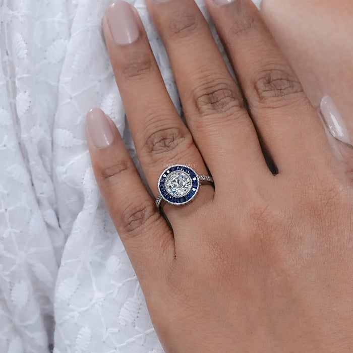 OEC Round Diamond Surround Sapphire Baguette Halo Ring