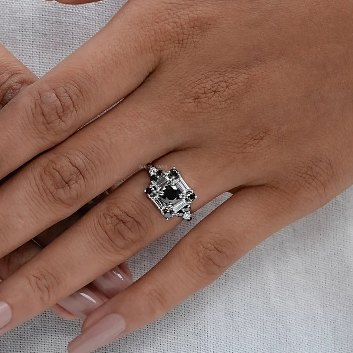 black round cut lab diamond baguette halo ring on model's hand