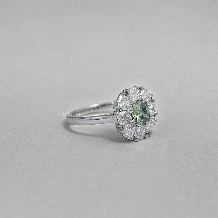 side view of green cushion cut lab diamond halo engagement ring
