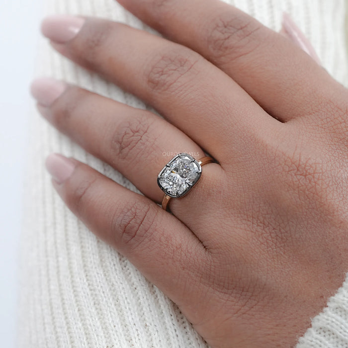 east west cushion cut lab diamond black coating engagement ring in finger