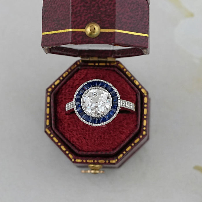 OEC Round Diamond Surround Sapphire Baguette Halo Ring
