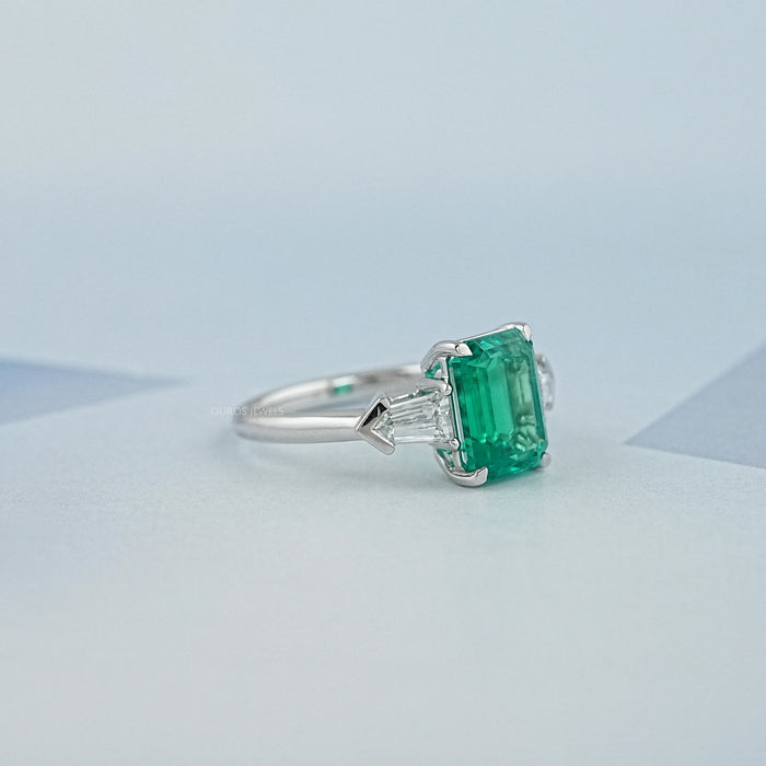 Three Stone Emerald And Bullet Cut Diamond Ring