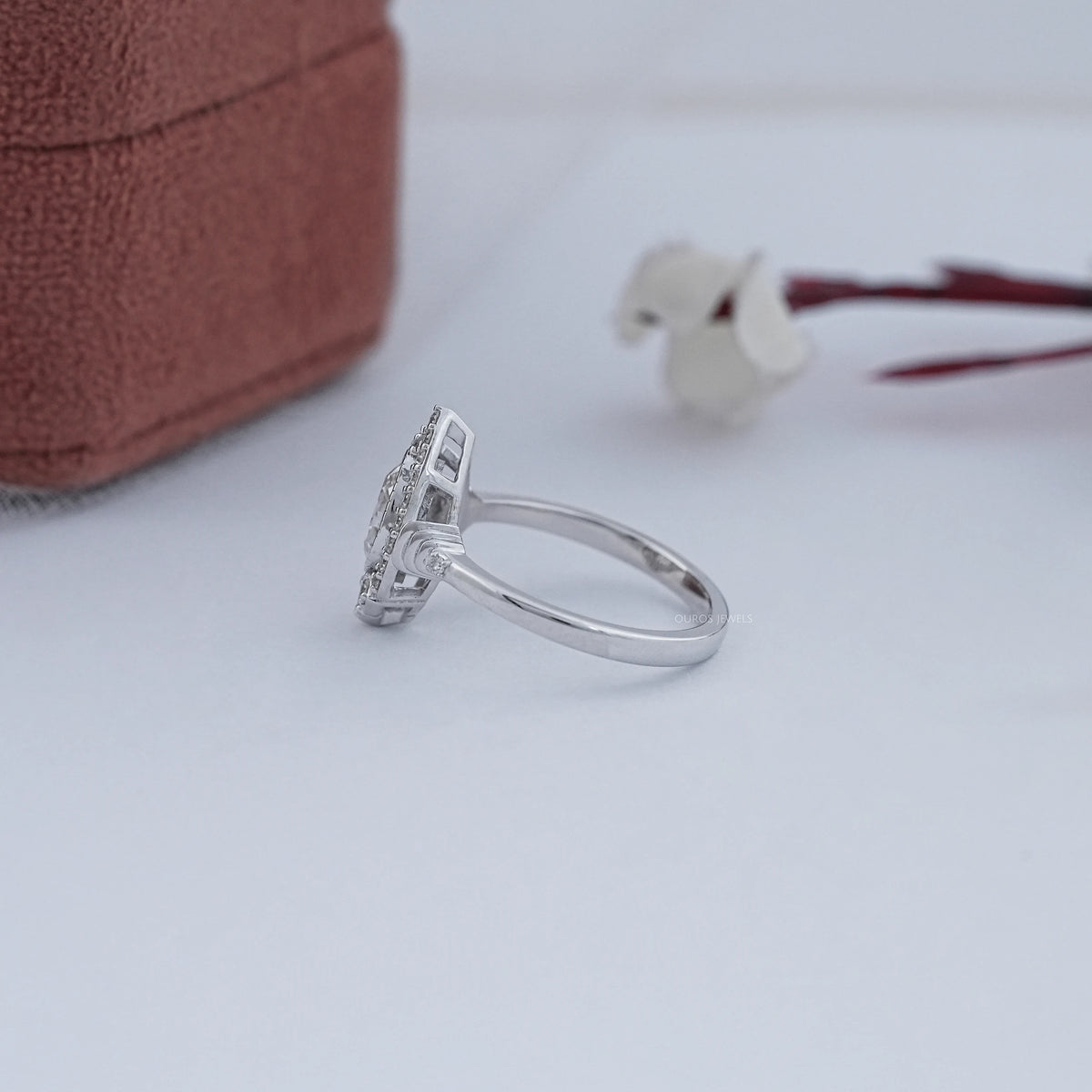 Old Mine Pear Cut And Single Round Halo Engagement Ring