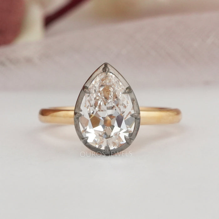 front view of antique old cut pear shaped diamond engagement ring