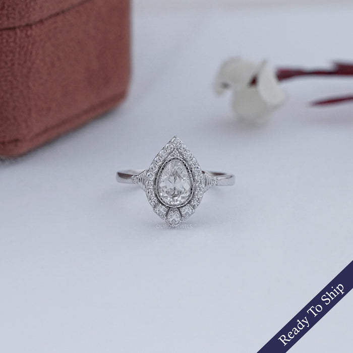 Old Mine Pear Cut And Single Round Halo Engagement Ring