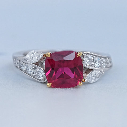 front view of pink ruby cushion cut gemstone solitaire split-shank wedding ring