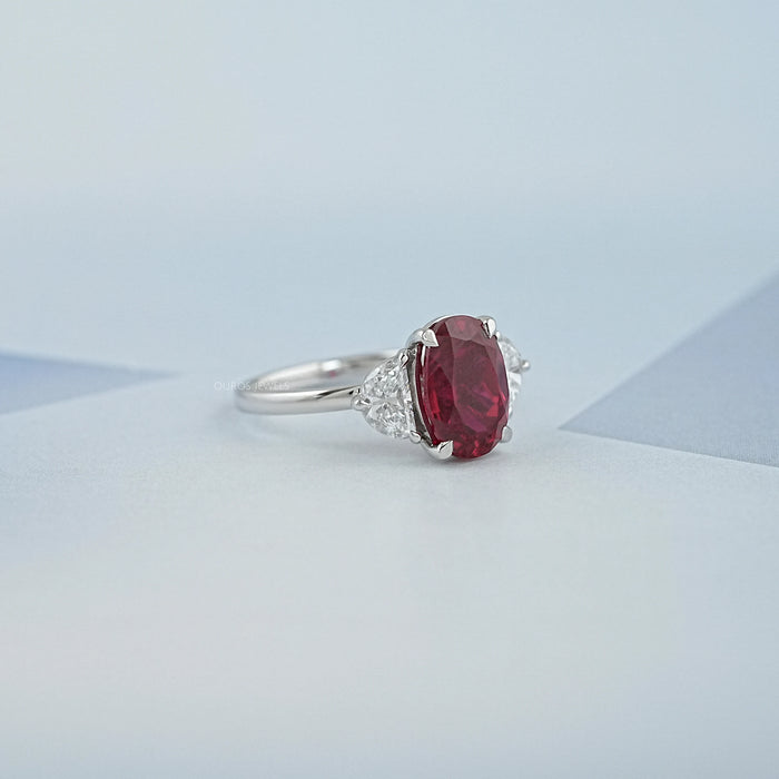 3 Stone Oval Ruby And Half Moon Diamond Ring