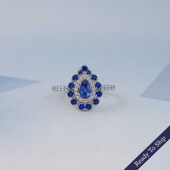 Blue Pear And Round Cut Double Halo Solitaire Accent Ring