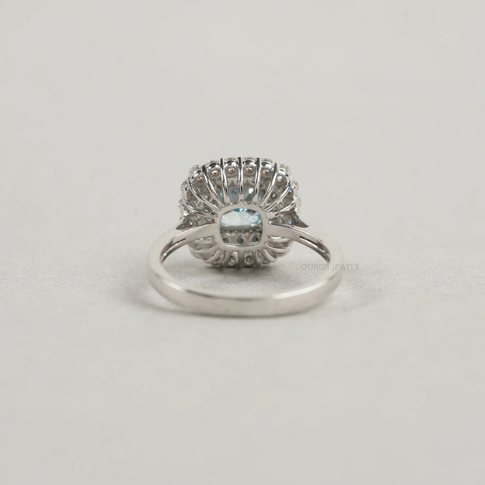back view of fancy blue cushion cut lab diamond double halo wedding ring