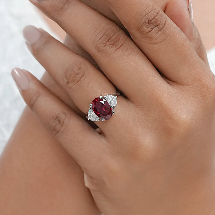 3 Stone Oval Ruby And Half Moon Diamond Ring