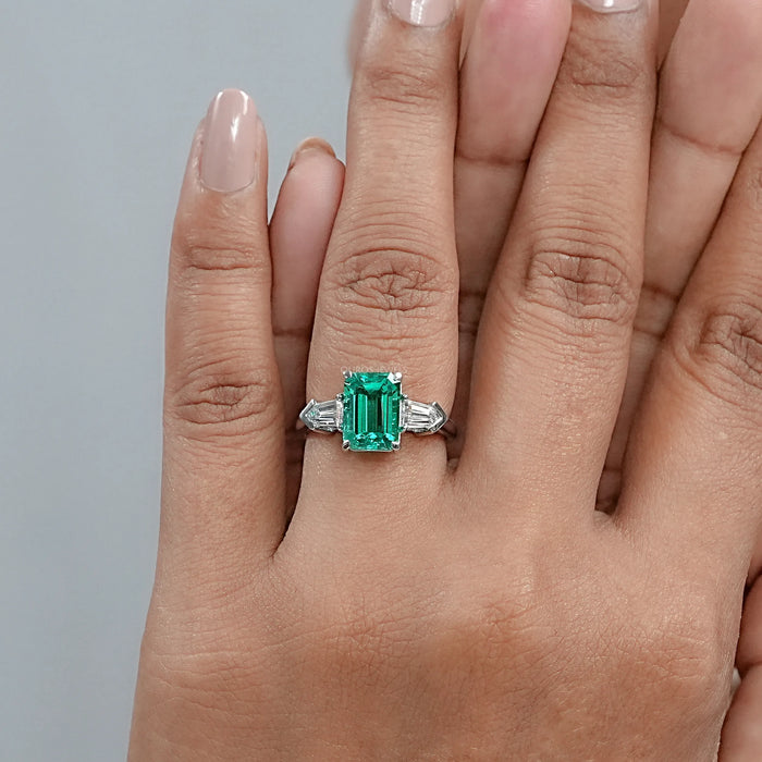 Three Stone Emerald And Bullet Cut Diamond Ring