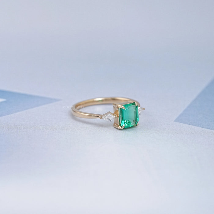Emerald Gemstone And Kite Cut Three Stone Engagement Ring