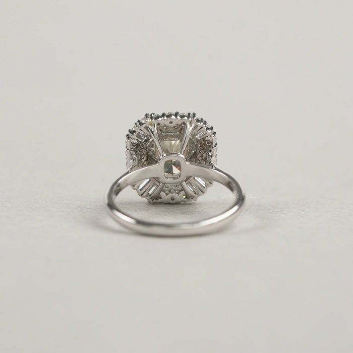 back view of yellow cushion cut diamond bezel set halo cluster engagement ring