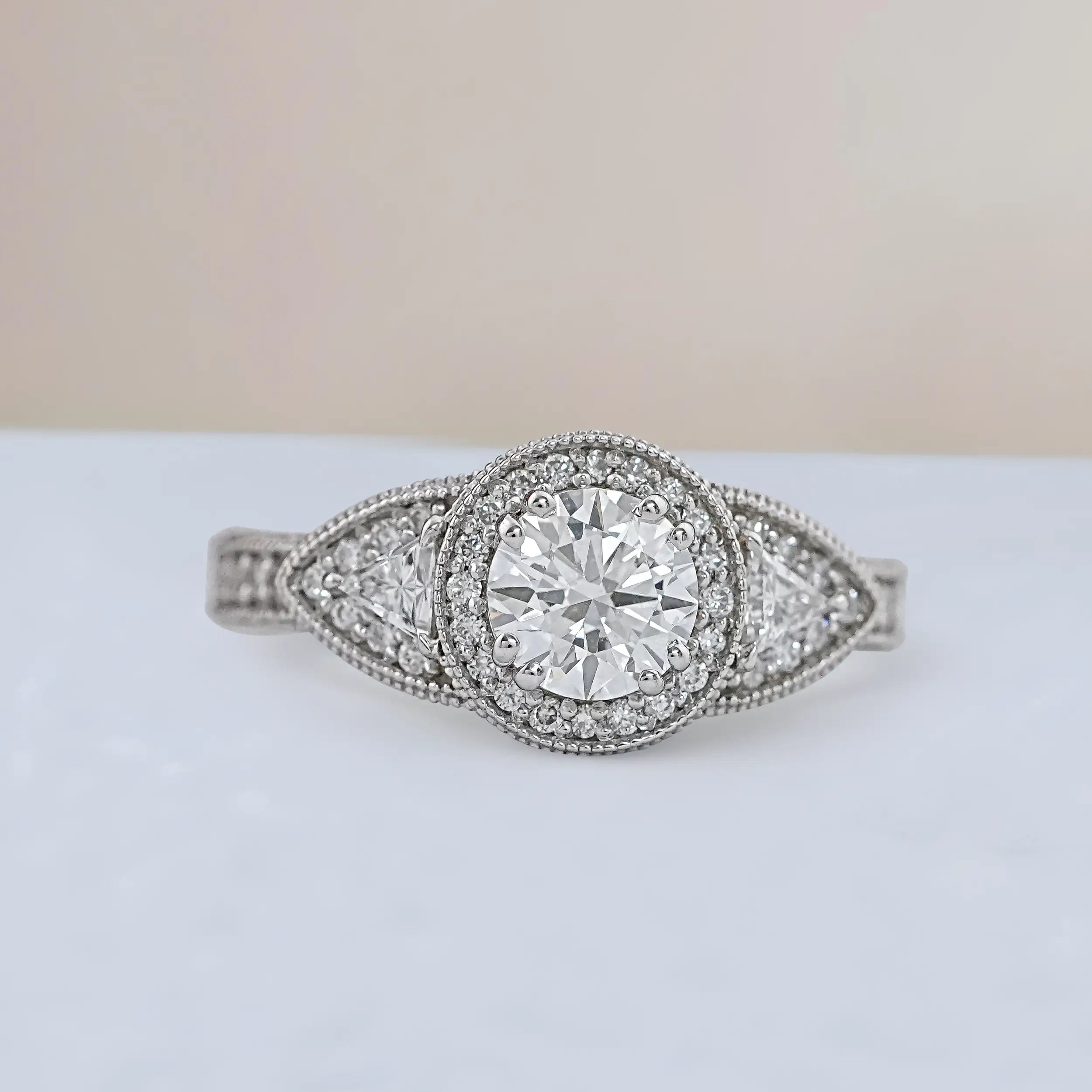 Round Diamond Three Stone Ring