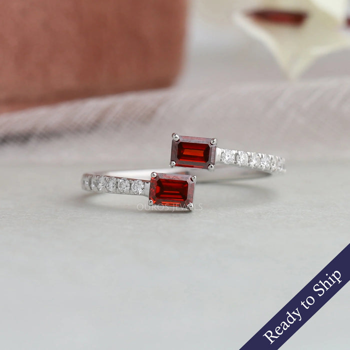 Red emerald two stone lab grown diamond ring with round accent stones in 14k white gold