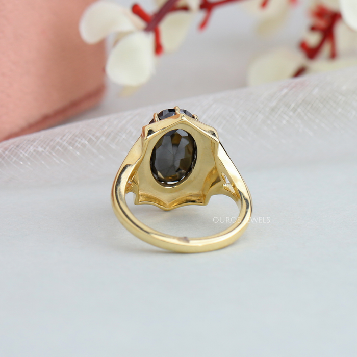 10k, 14k, and 18k yellow gol black oval gemstone solitaire ring