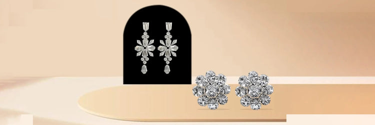 Image showing 2 pair of earrings in dangle drop and cluster lab grown diamond earrings