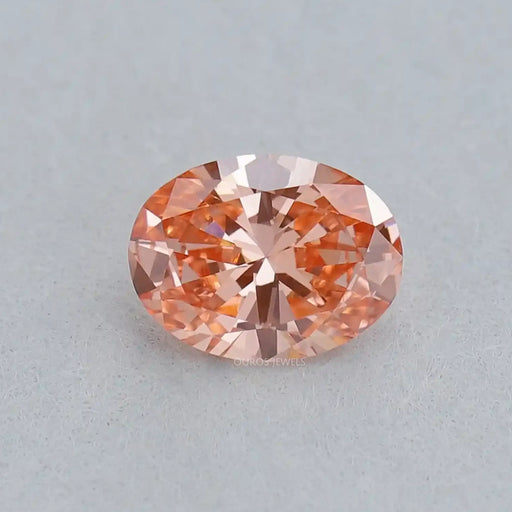 front view of fancy pink vivid oval cut lab grown loose diamond
