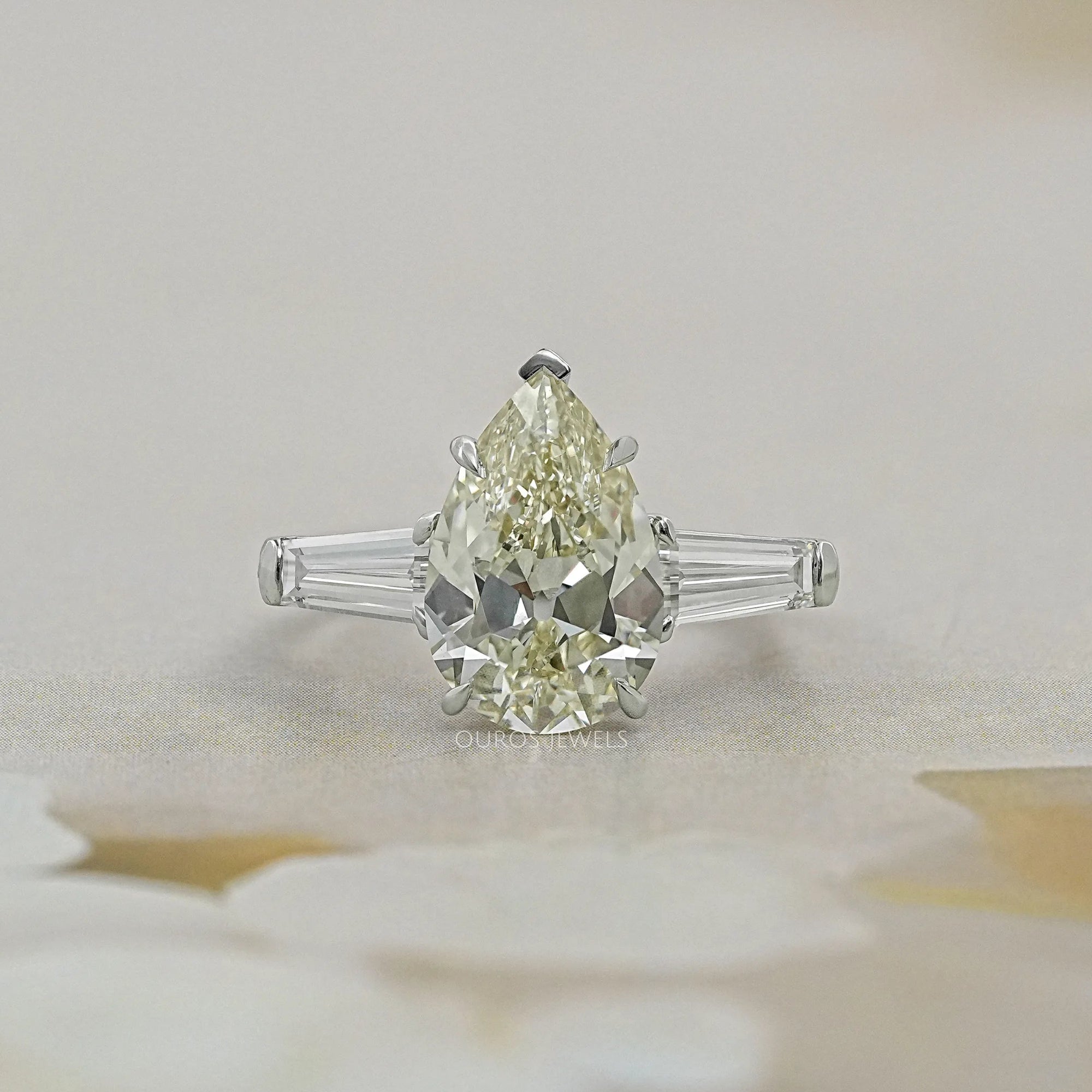 3 Stone Pear and Tapered Baguette Diamond Ring
