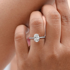 Oval Shape Solitaire With Accent Ring