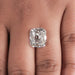 10 Carat IGI Certified Old Mine Cushion Cut Diamond placed on a finger.