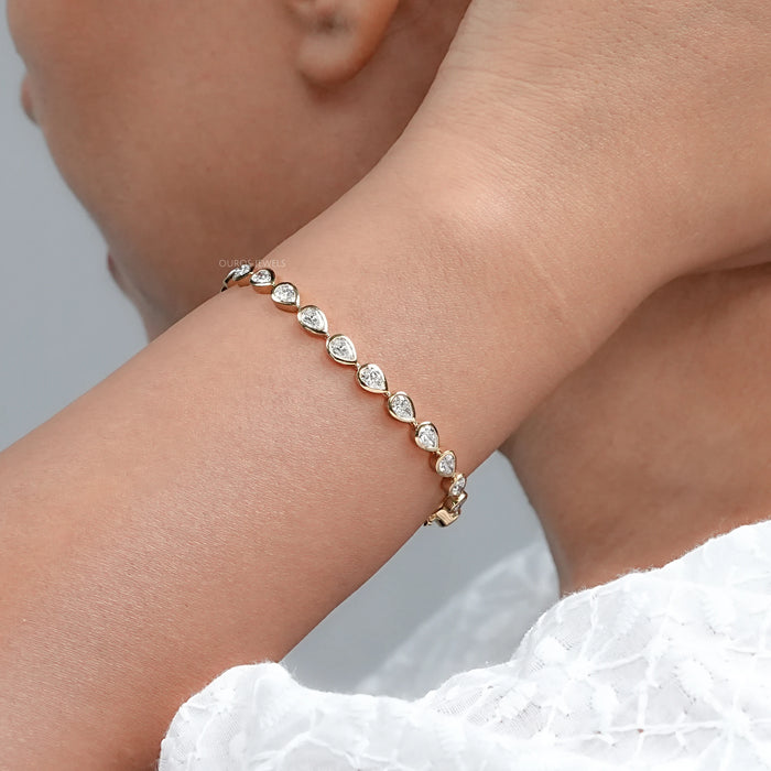 Bezel Set Pear Cut East West Set Tennis Bracelet