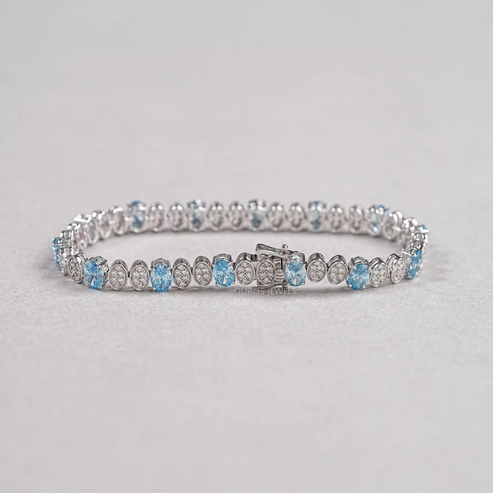 Alternating Blue Oval & Round Diamond Tennis Bracelet