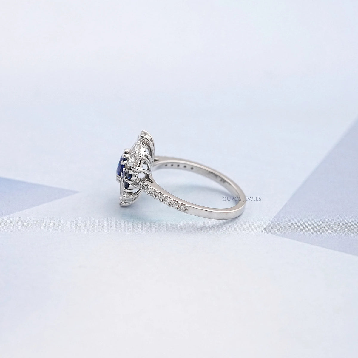 Sapphire Round And Tapered Baguette Diamond Cluster Ring