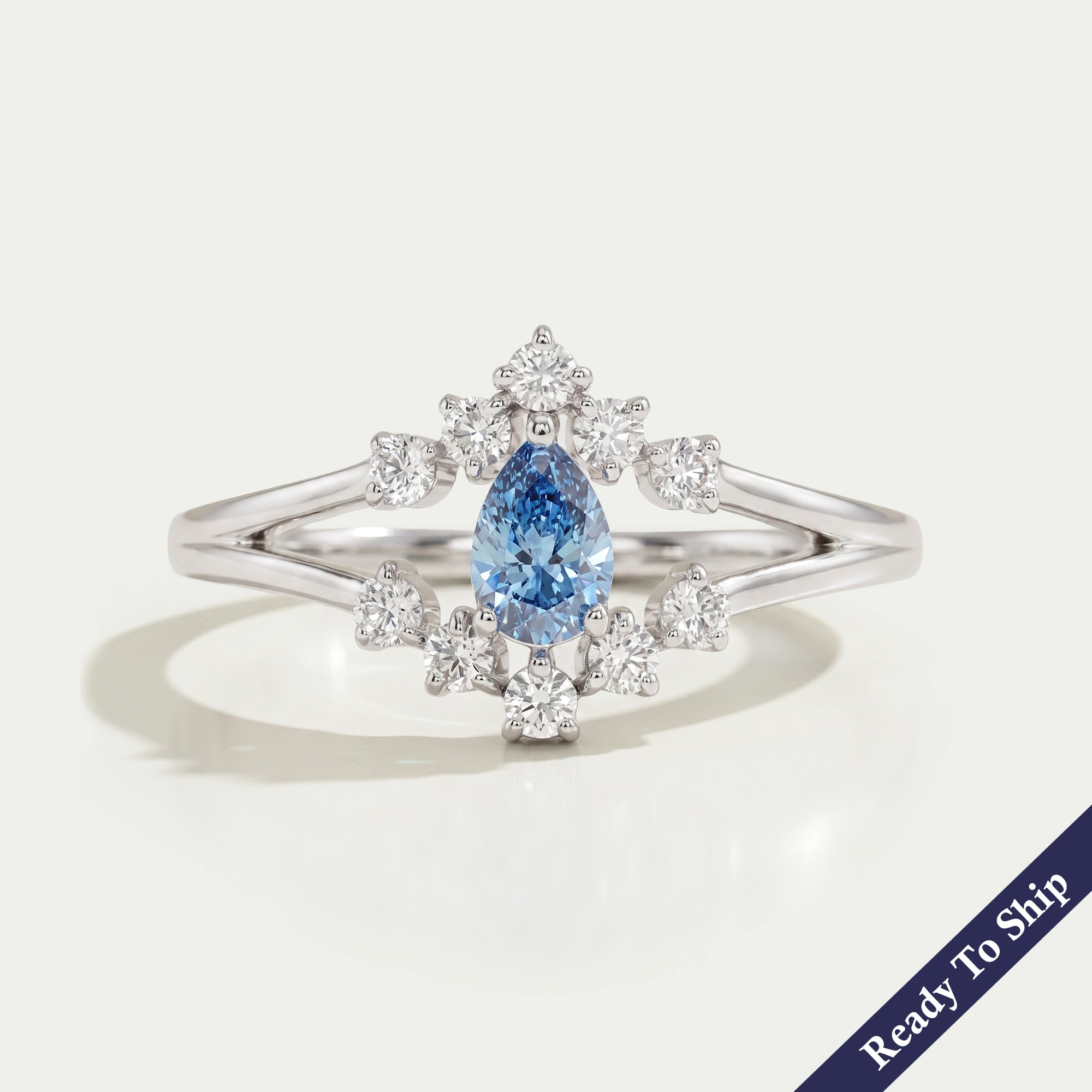 Blue Pear Cut Split Shank Wedding Ring