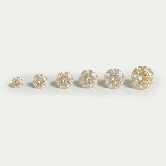 Brilliant Round Cut Fancy Yellow Diamonds