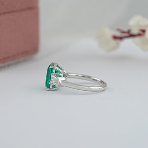 Three-Stone Emerald And Bullet Cut Diamond Ring