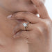 dutch marquise-cut diamond engagement ring with 2 yellow bands on model's finger
