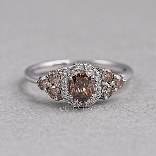front view of brown cushion cut diamond halo wedding ring on grey fabric