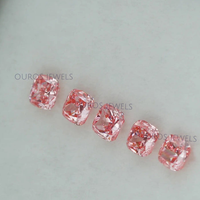 side view of each pink cushion cut man made diamonds loose