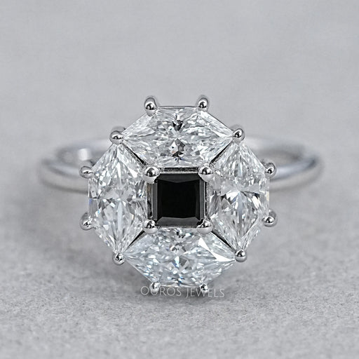 top view of princess cut lab diamond dutch marquise halo ring on grey fabric