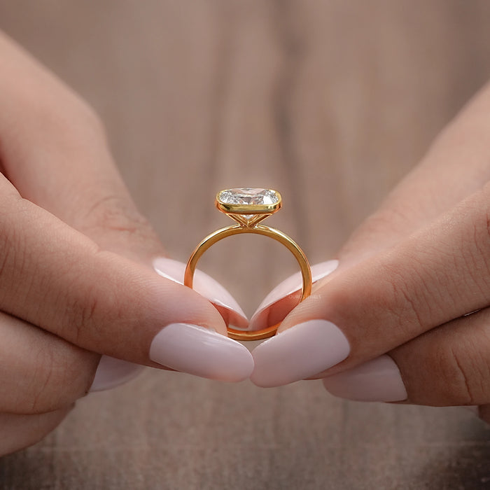 East West Cushion Diamond Bezel Set Solitaire Ring