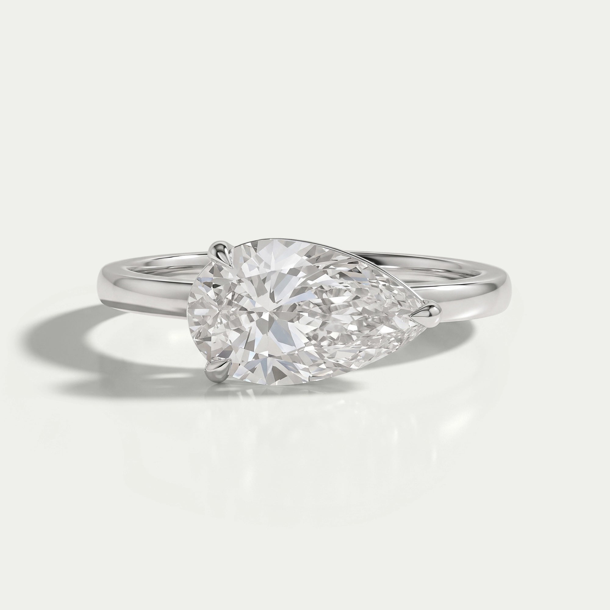 East West Pear Diamond Solitaire Engagement Ring Rings