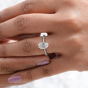 Oval Shape Solitaire With Accent Ring