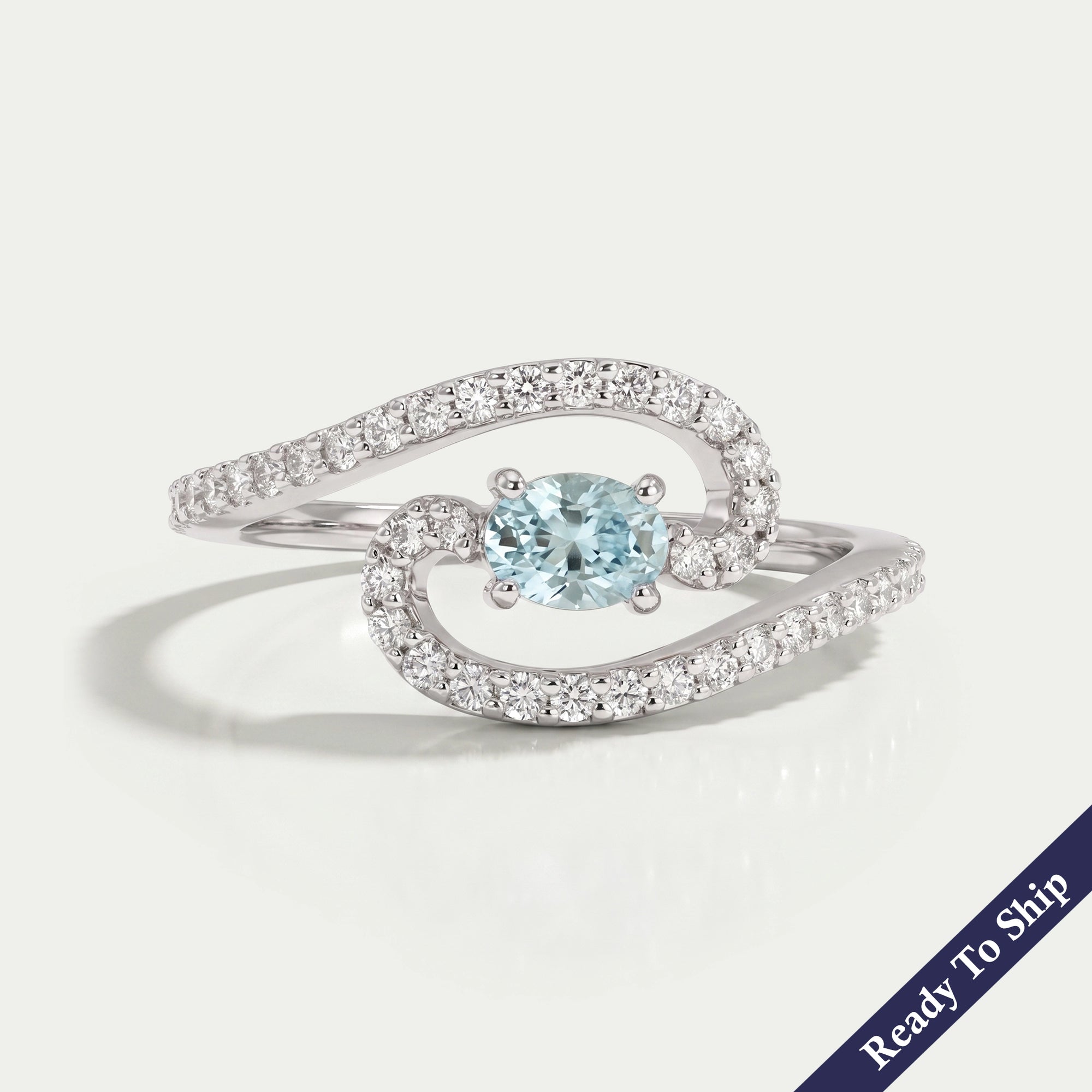Blue Oval Diamond Bypass Engagement Ring