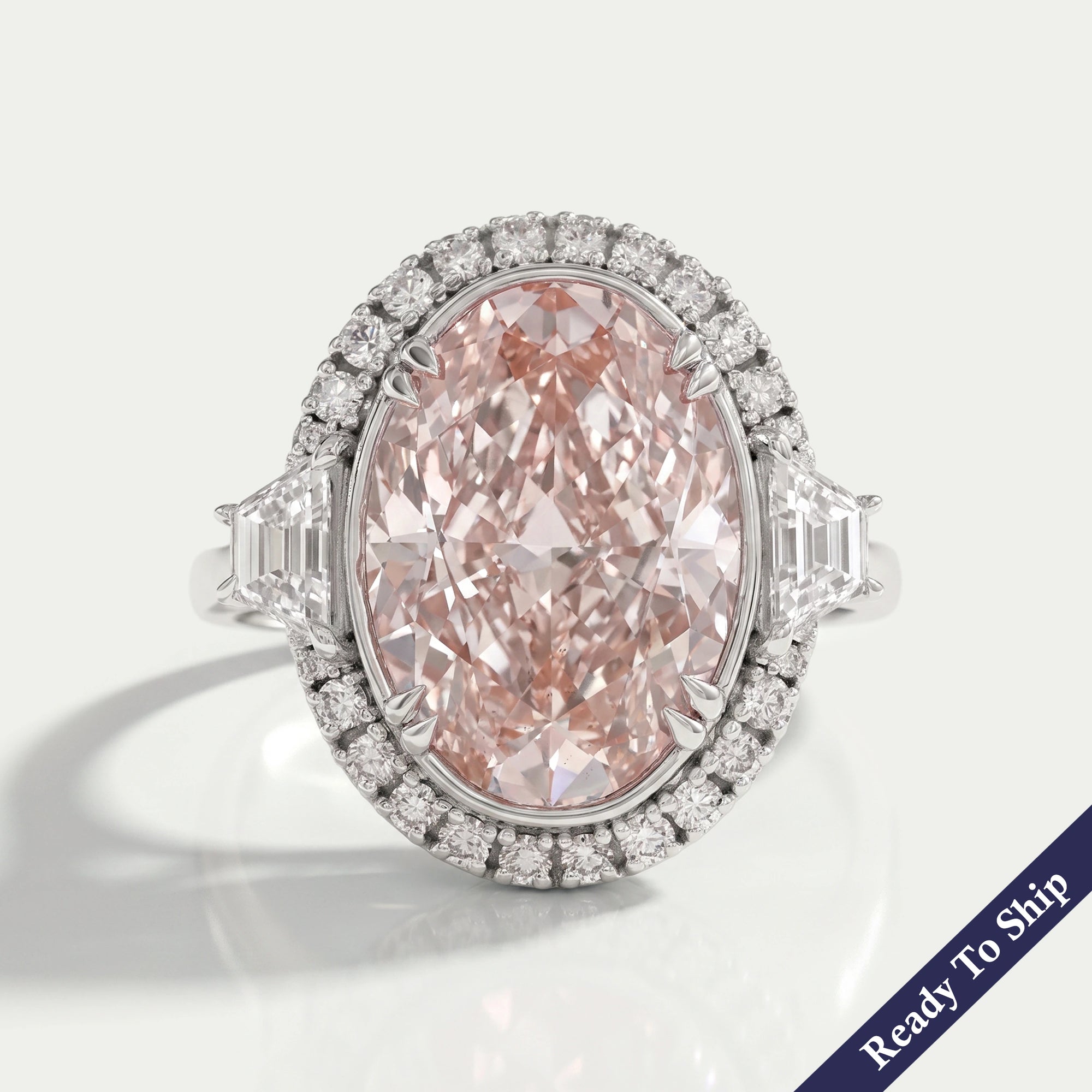 Pink Oval Cut With Trapezoid Accent Halo Engagement Ring Rings