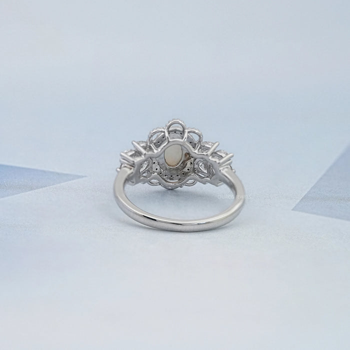 Opal Oval Cut And Halo Diamond Floral Engagement Ring