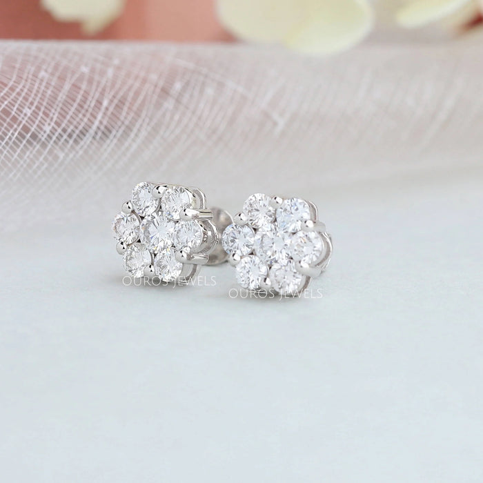 side view of floral round halo diamond screw back stud earrings white gold