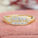 front view of round cut lab diamond yellow gold men's engagement ring