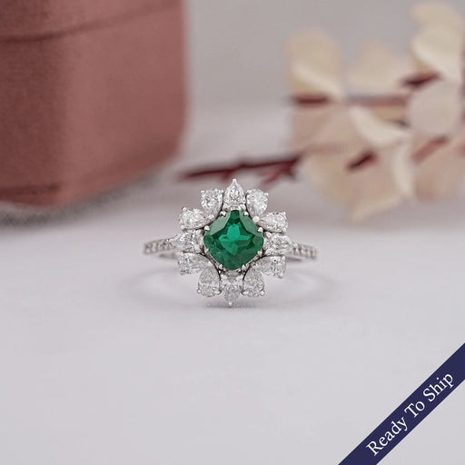 green colroed cushion cut gemstone ring