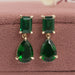 front view of green emerald and pear gemtsone prong setting drop earrings
