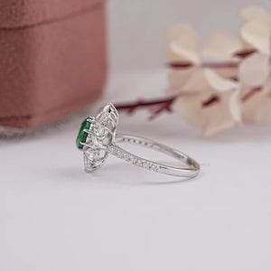 green gemstone ring in cushion shape 