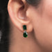 green emerald and pear gemtsone claw prongs drop earrings yellow gold on ear