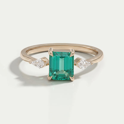 Emerald Gemstone And Kite Cut Three Stone Engagement Ring