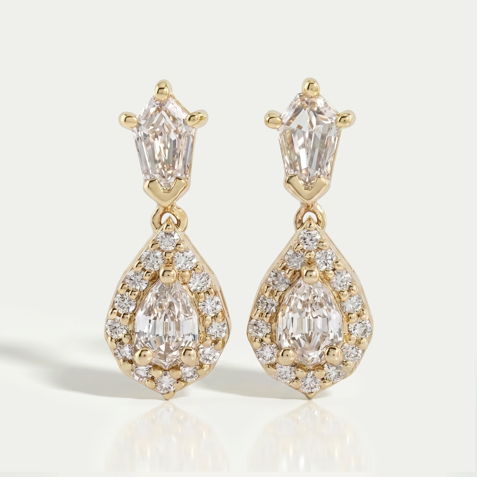 Step Cut Pear Halo Diamond Dangle Earrings