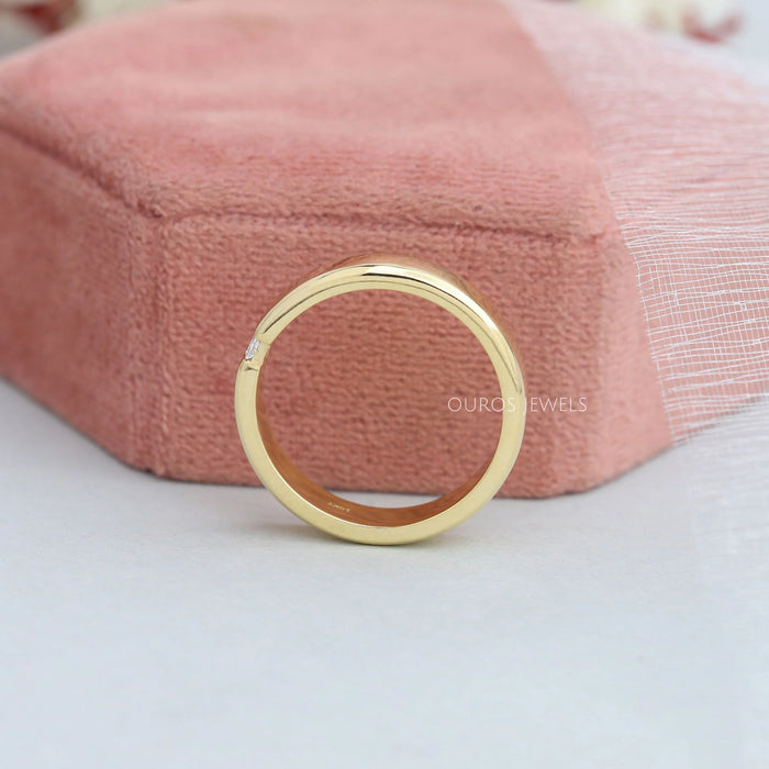 side view of baguette cut lab grown diamond mens engagement ring yellow gold